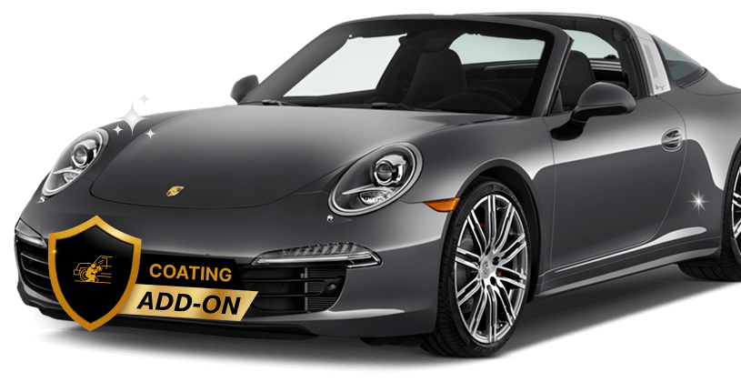Shiny dark gray Porsche convertible with a high-gloss finish, featuring a "Coating Add-On" badge on the front, emphasizing a protective or cosmetic vehicle coating service.